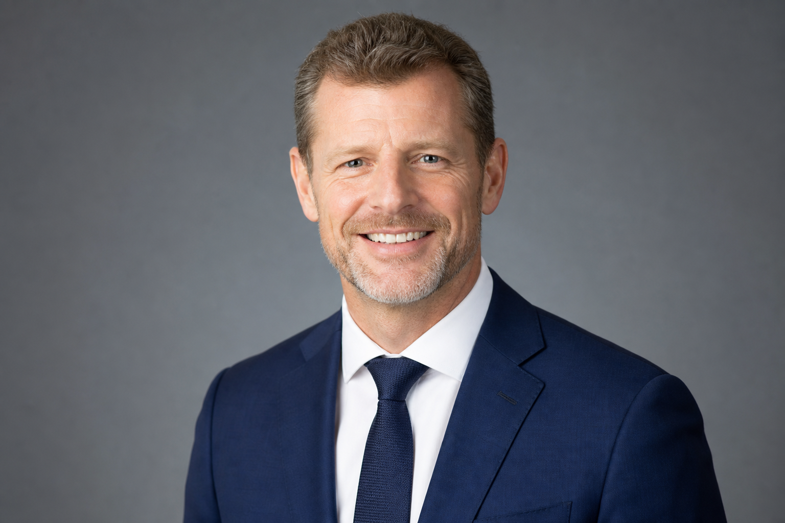 Senior tech consultant smiling